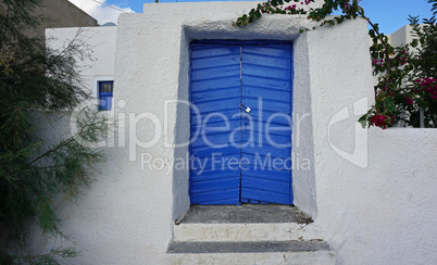 colorful door in oia village on santorini island