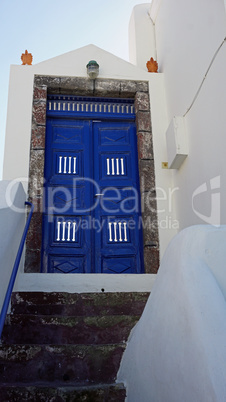 colorful door in oia village on santorini island