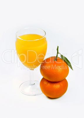Citrus juice and two tangerines