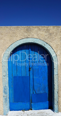 door in small greece village exo gonia on santorini