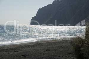 volcanic beach in kamari on santorini siland