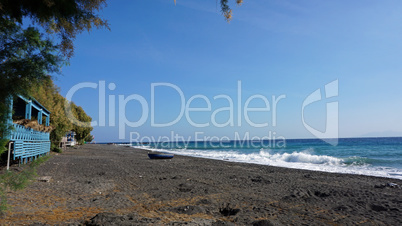 volcanic beach in kamari on santorini siland