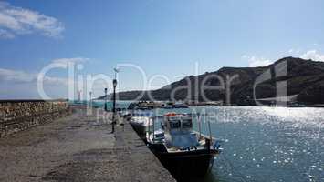 small harbor of porto castello on santorini