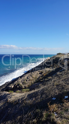 wild coast of santorini island near perissa