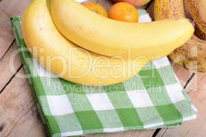 mandarin, bananas and apples, health fresh food close up