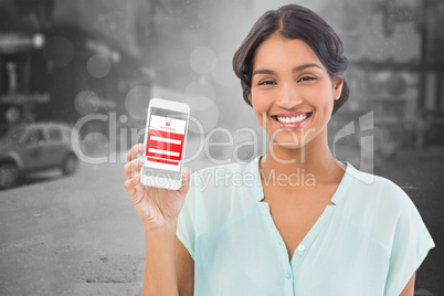 Composite image of businesswoman showing mobile phone over white