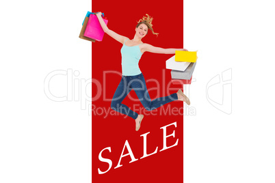 Composite image of excited blonde jumping while holding shopping