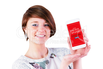 Composite image of beautiful woman presenting smart phone on whi