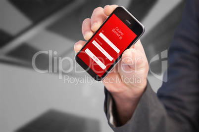 Composite image of hand of businessman showing smartphone