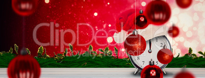 Composite image of christmas clock