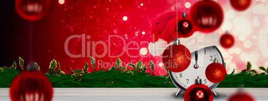 Composite image of christmas clock