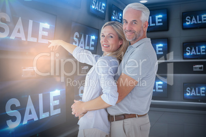 Composite image of wife showing while husband standing