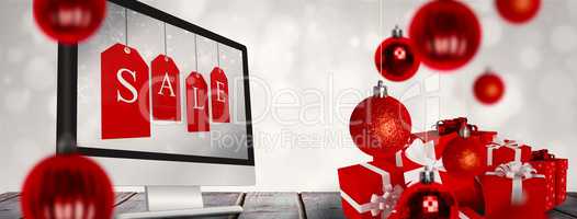Composite image of red gifts with white bow