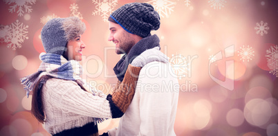 Composite image of young winter couple