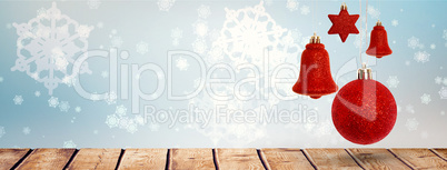 Composite image of red christmas bell decoration hanging