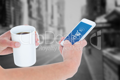 Composite image of woman using smartphone while holding coffee