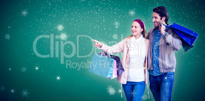 Composite image of smiling couple walking hand in hand and going