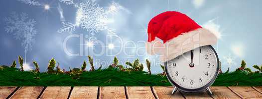 Composite image of christmas clock