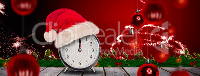 Composite image of christmas clock