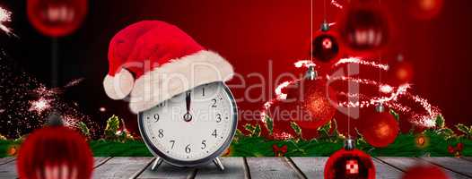 Composite image of christmas clock