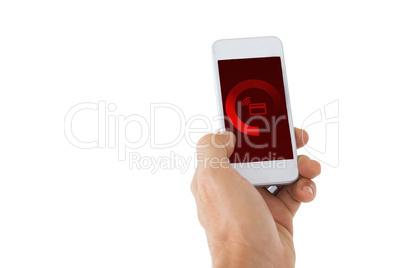 Composite image of male hand holding a smartphone