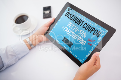 Composite image of man using tablet pc