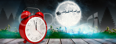 Composite image of alarm clock counting down to twelve