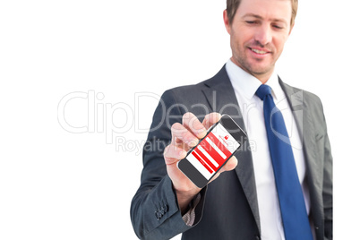 Composite image of businessman showing his smartphone screen