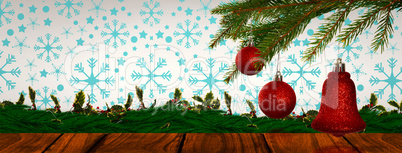 Composite image of red decorations on branch