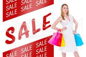 Composite image of happy blonde holding shopping bags in white d