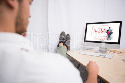 Composite image of businessman with legs crossed at ankle on off