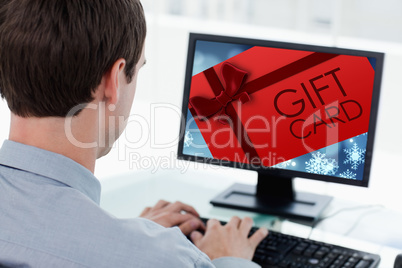 Composite image of gift card with festive bow