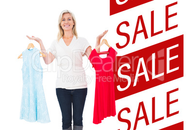 Composite image of pretty shopping blonde choosing a dress