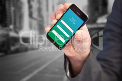 Composite image of hand of businessman showing smartphone