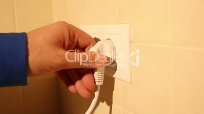Using a wall electric socket