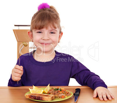 happy little girl eating