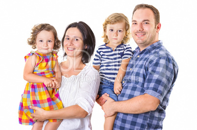 Happy family of four smiling