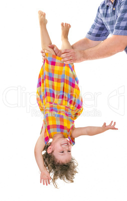 Happy little girl upside down