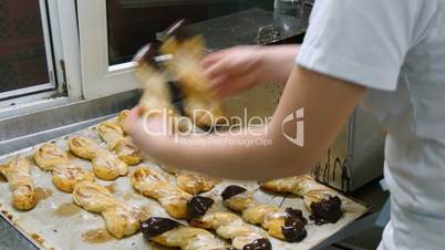 german baker dip pastery roll into liquid chocolate 11695