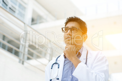 Asian Indian medical doctor thinking