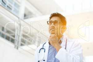 Asian Indian medical doctor thinking