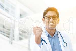 Asian Indian medical doctor celebrating success