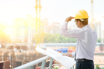 Asian Indian male site contractor engineer on site