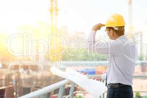 Asian Indian male site contractor engineer on site