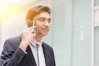 Asian Indian businessman on the phone