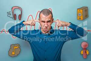 businessman man put his fingers in his ears and winced sound wav