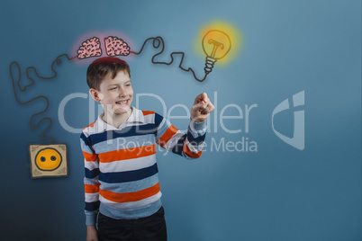 Teenage boy laughing and holding a finger subject igniter charge