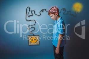 Teenage boy stands sideways lowered his head thinking brain boos