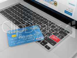 Credit Card and Red Buy Button on Computer Keyboard