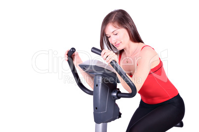 girl on cross trainer fitness exercise